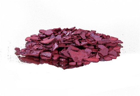 Dark red or brown crystalline solid flakes. Chromic acid is a strong acid and oxidizing agent. CrO3 is highly toxic and carcinogenic